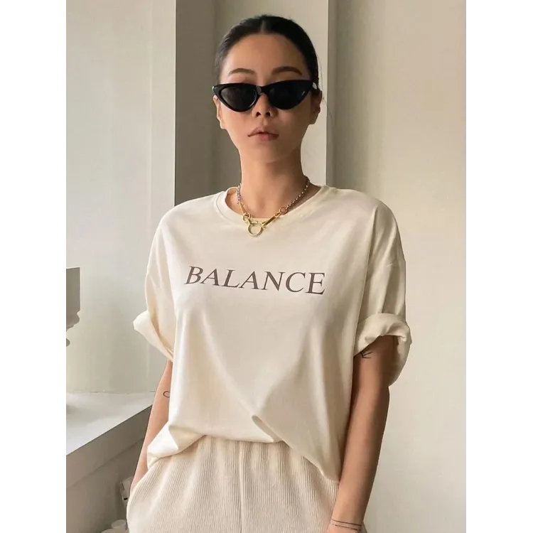 Футболка жіноча з принтом 44 Бежева 2634324585